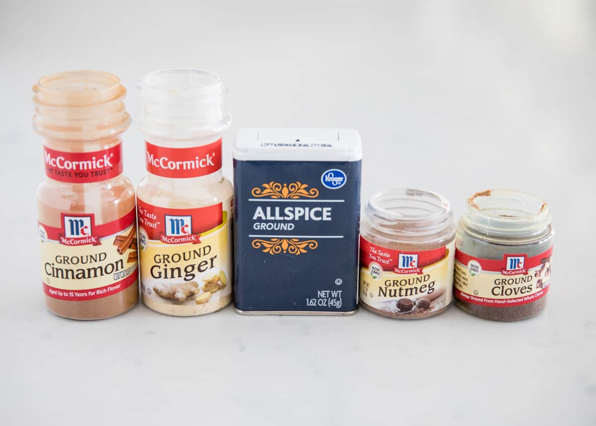 Pumpkin pie spice ingredients on counter.