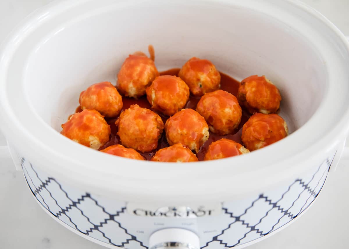 Buffalo chicken meatballs in crockpot.