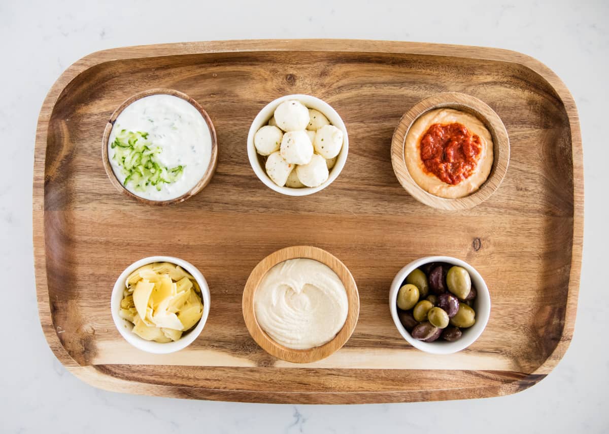 Bowls on wooden board.