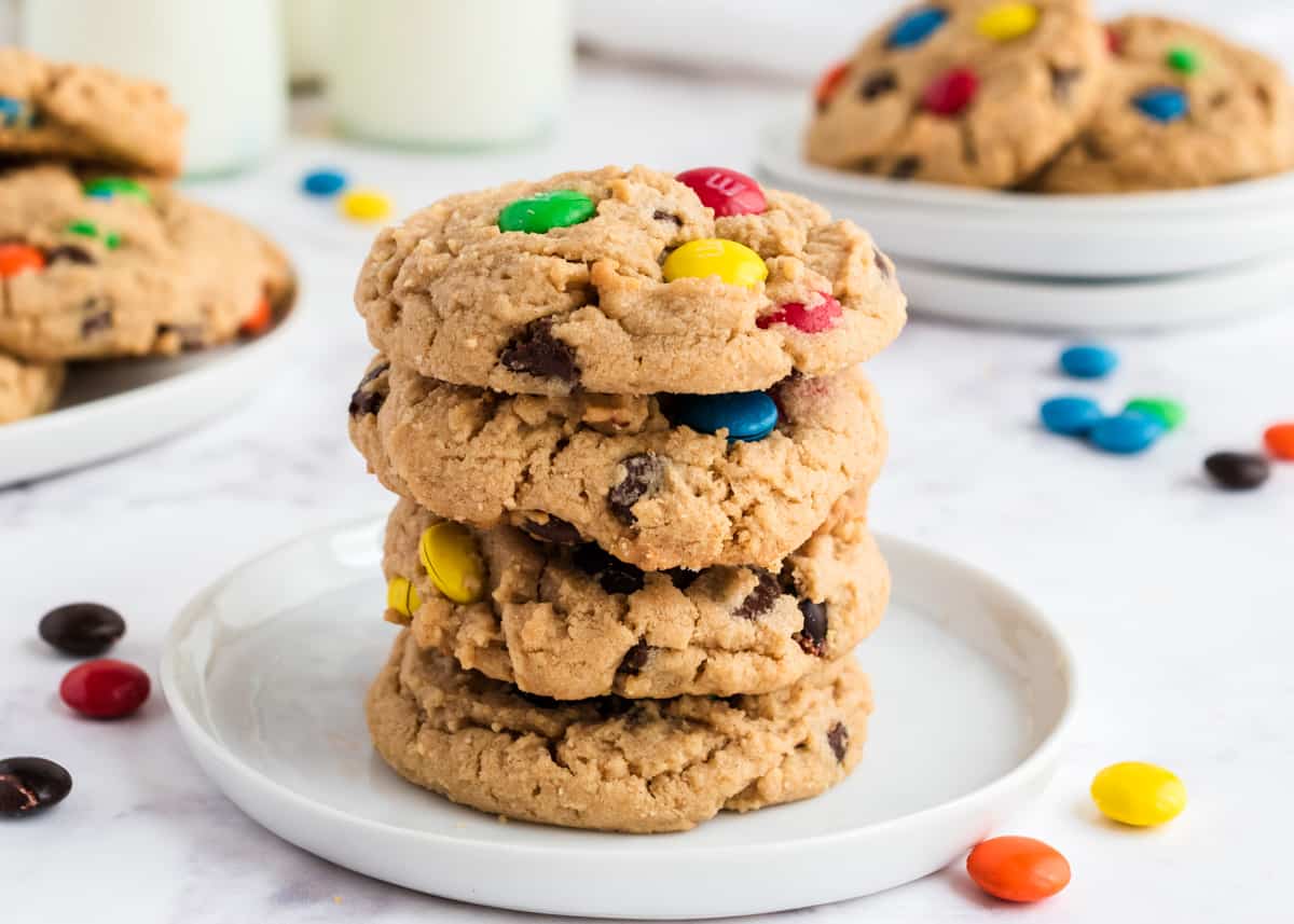Peanut butter m&m cookies on white plate.