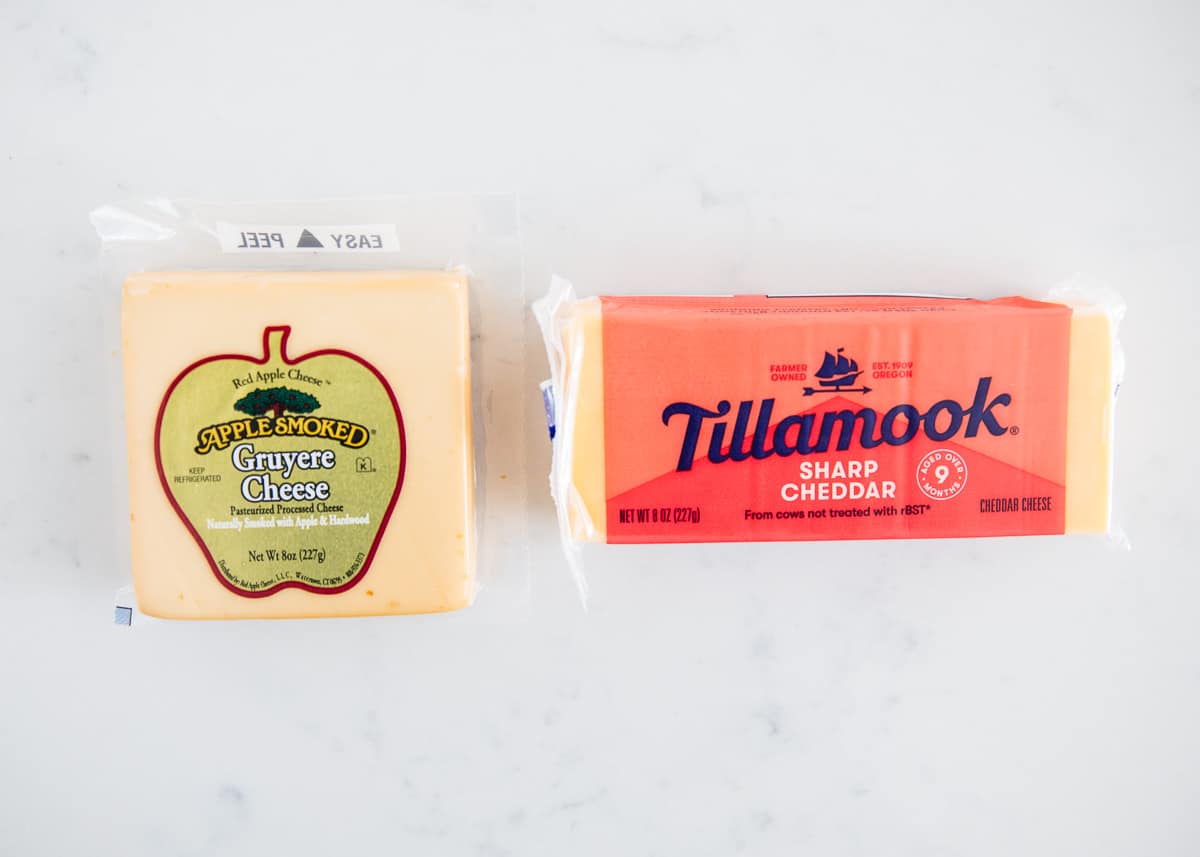 Blocks of cheese on counter.