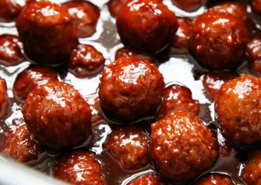 cranberry meatballs cooking in crockpot