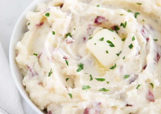 garlic red mashed potatoes in white bowl