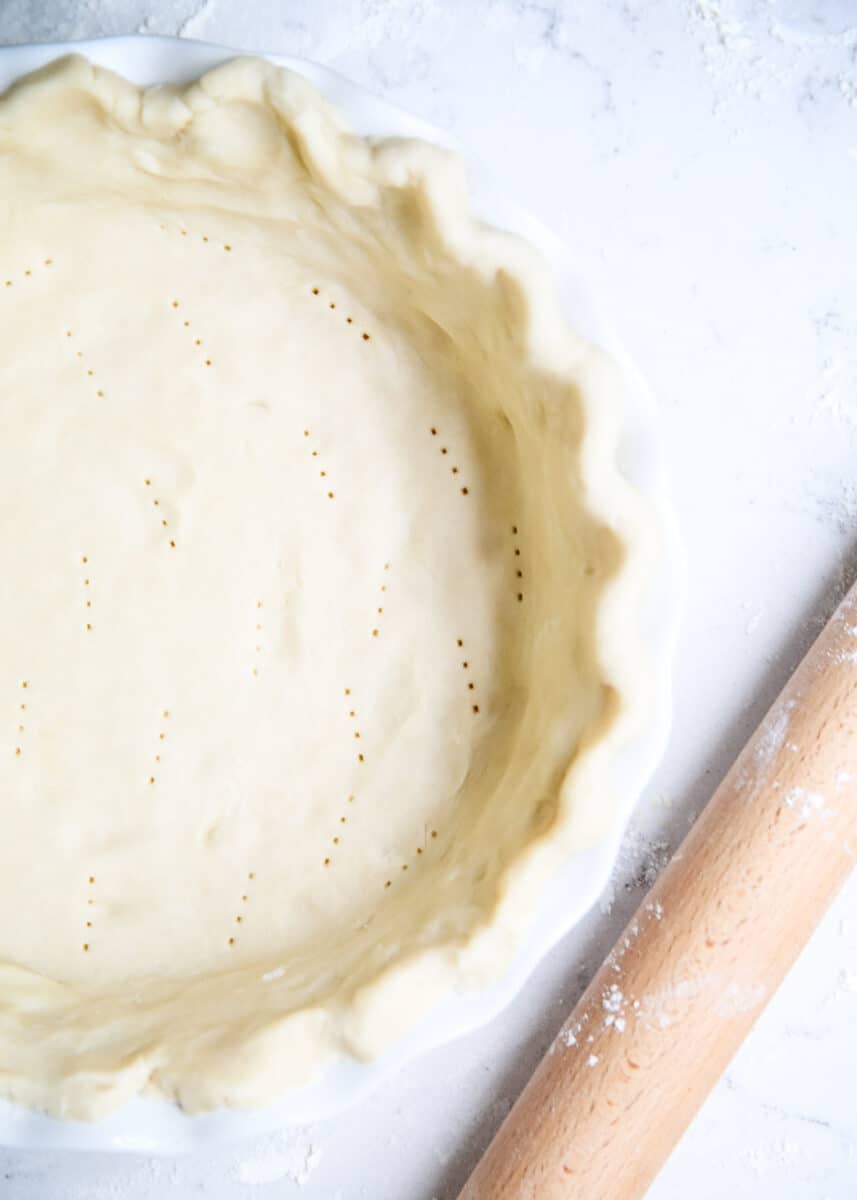 unbaked pie crust on counter