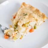 slice of turkey pot pie on white plate