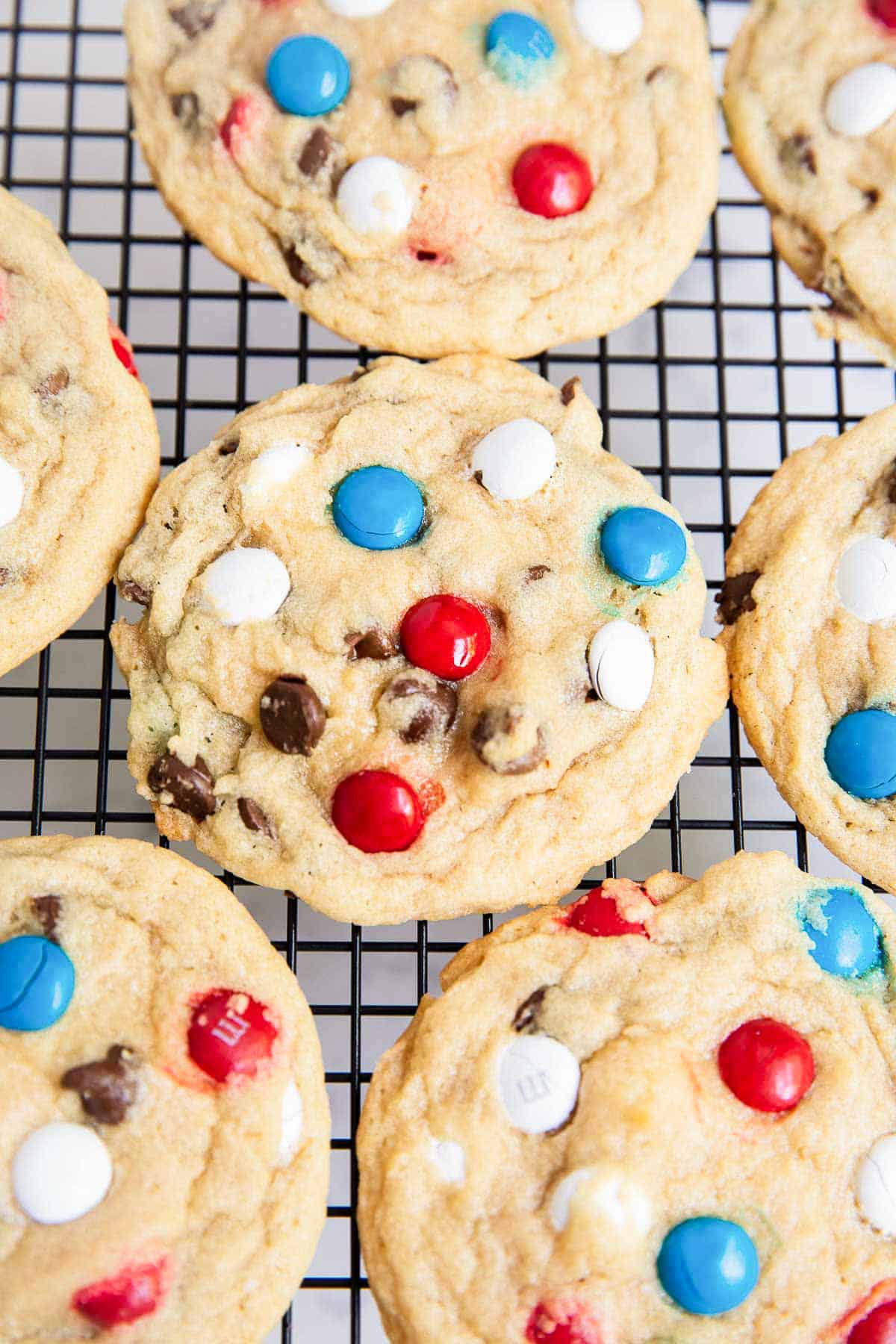 4th of July m&m cookies on cooling rack.