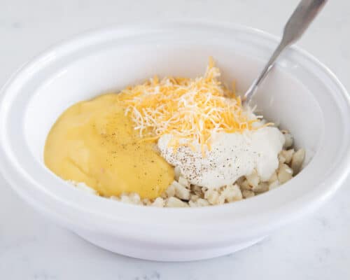 potatoes and cheese mixture in crockpot
