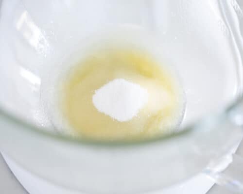 butter and sugar in glass bowl