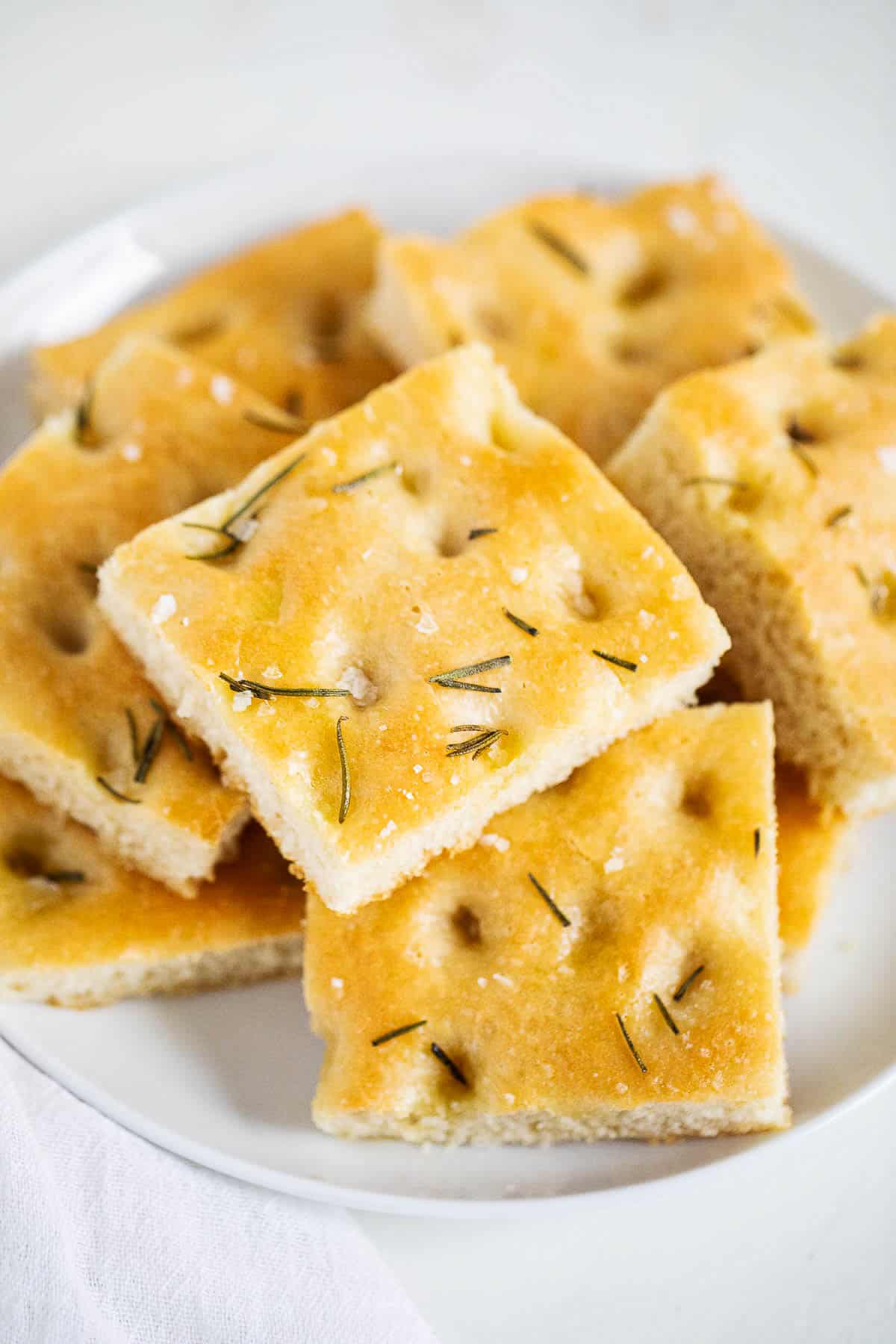 Rosemary focaccia close up on plate.