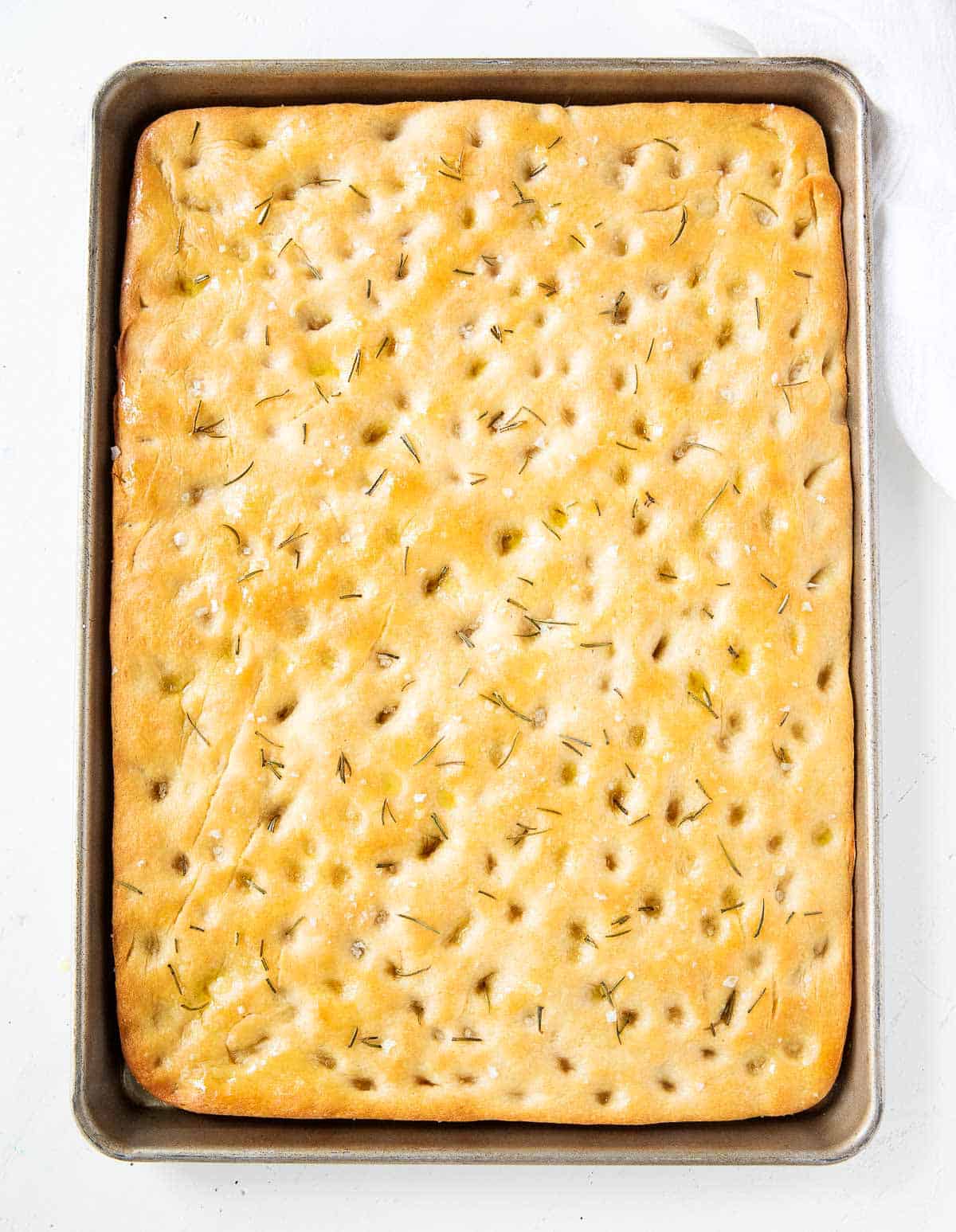 Rosemary focaccia in pan.