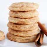 Stack of snickerdoodle cookies on a white plate.