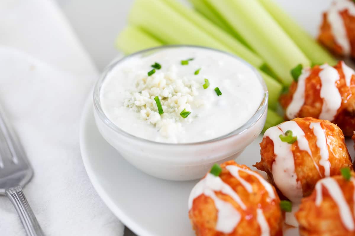 Blue cheese dressing with buffalo chicken meatballs.