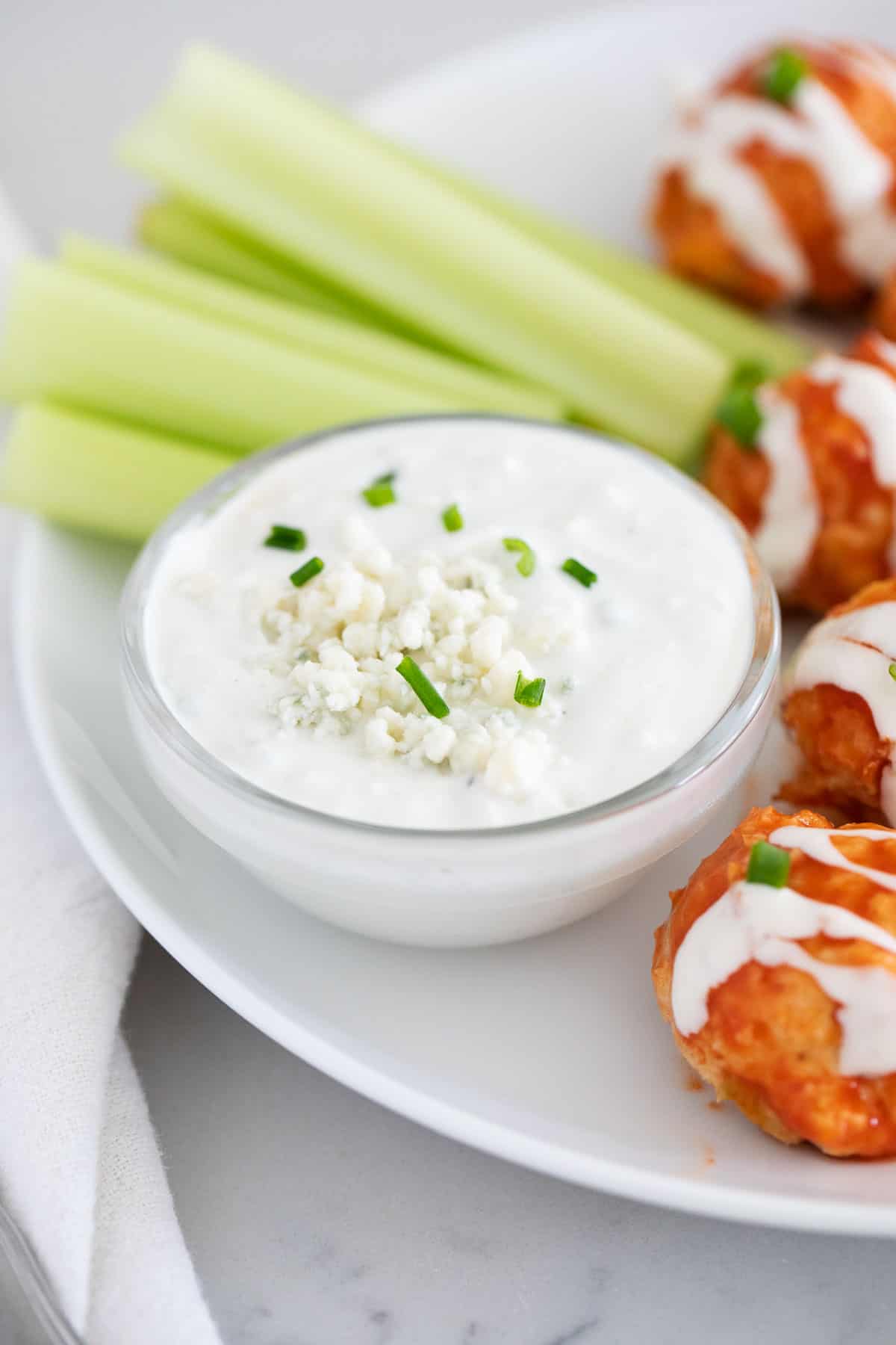 Blue cheese dressing with buffalo chicken meatballs.