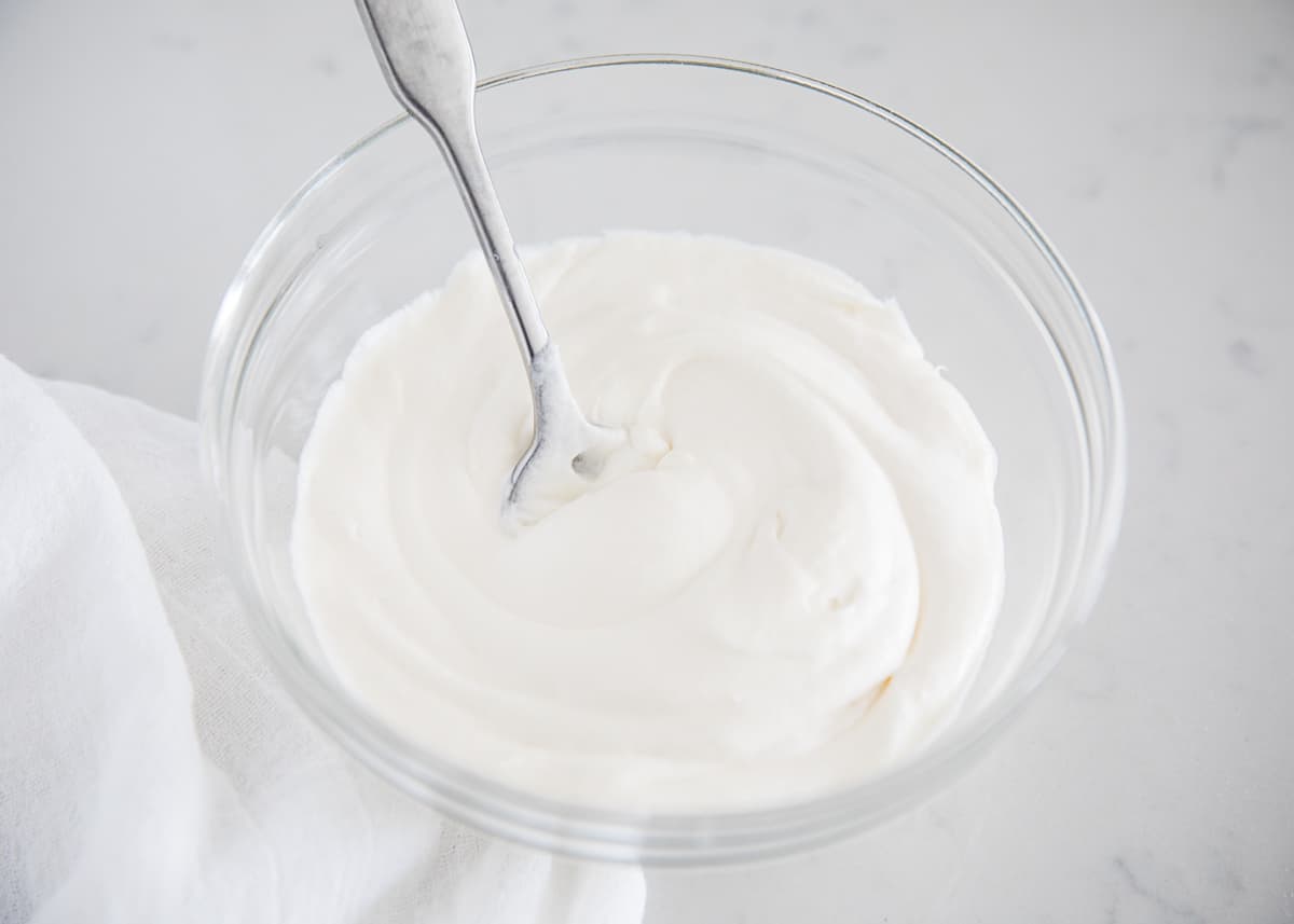 Cream cheese glaze in bowl.