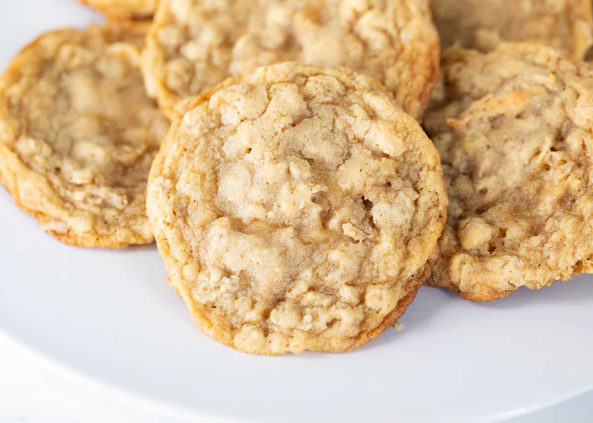 Oatmeal cookies on a white plate.
