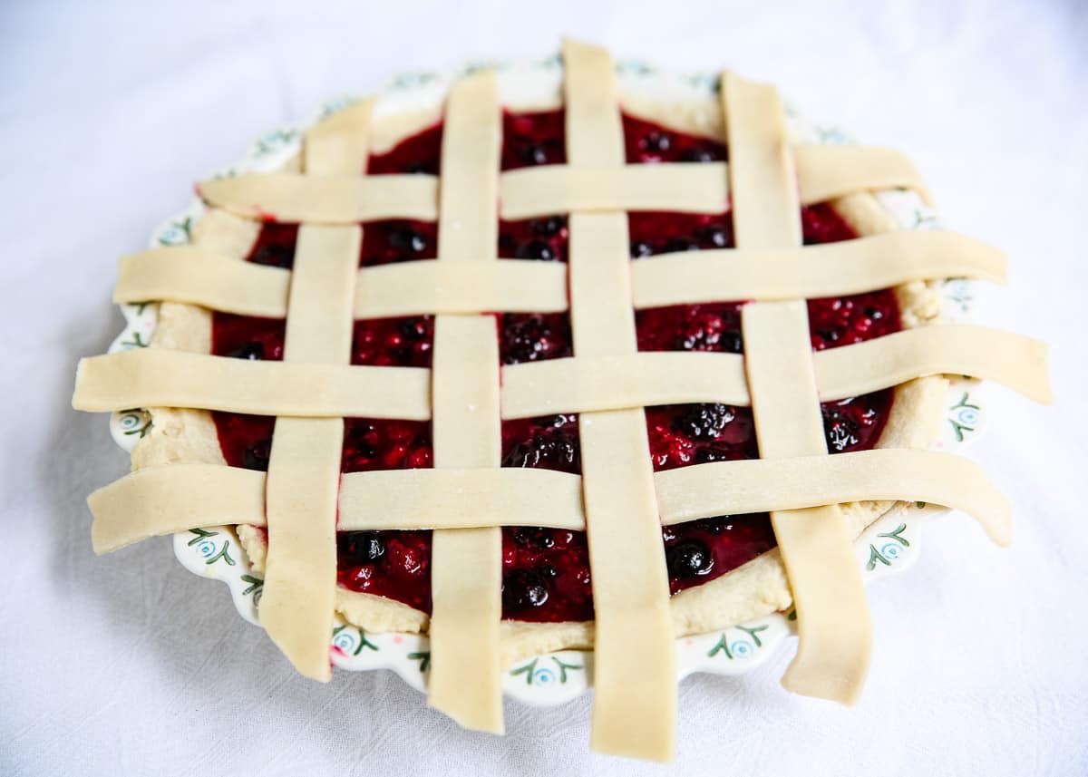 Making lattice crust from pie.