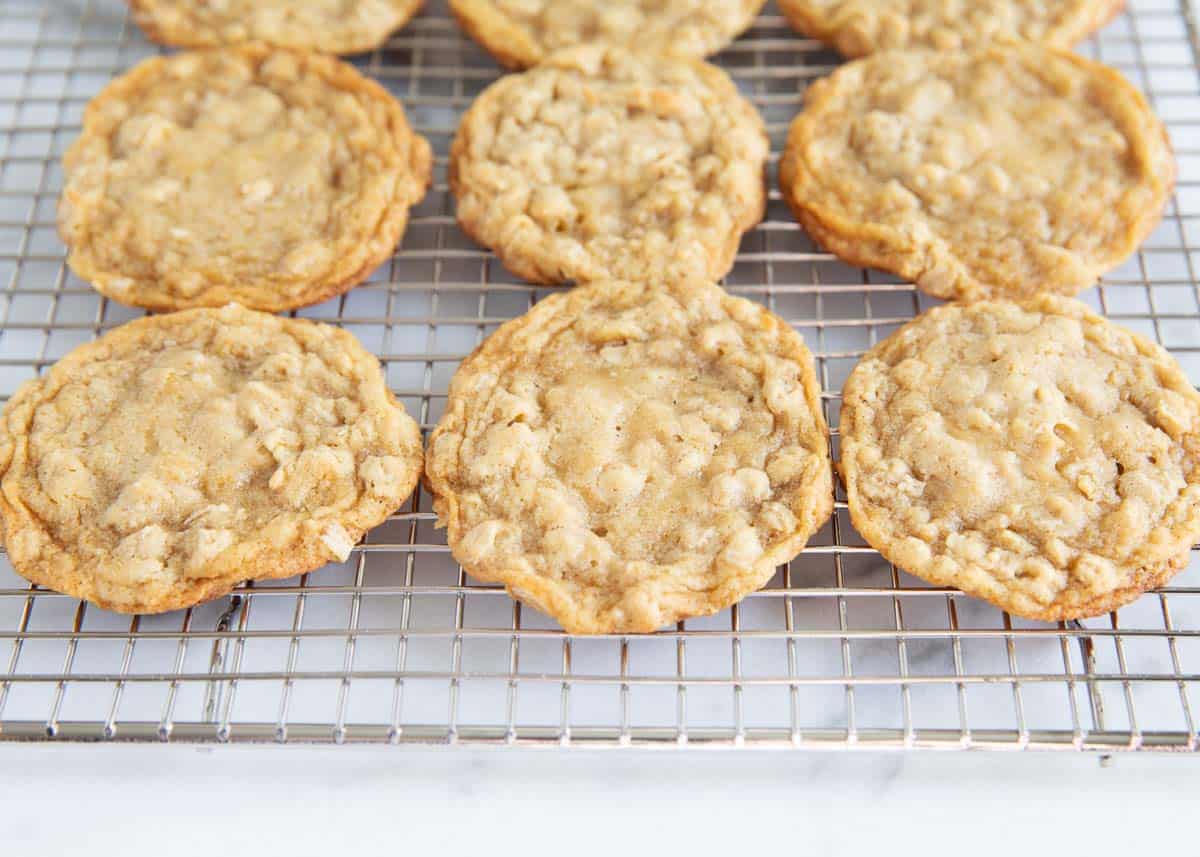 Oatmeal cookies on a cooling rack. 