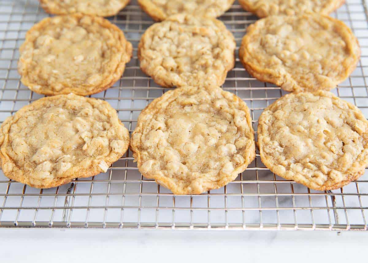 Oatmeal cookies cooling on a wire rack. 