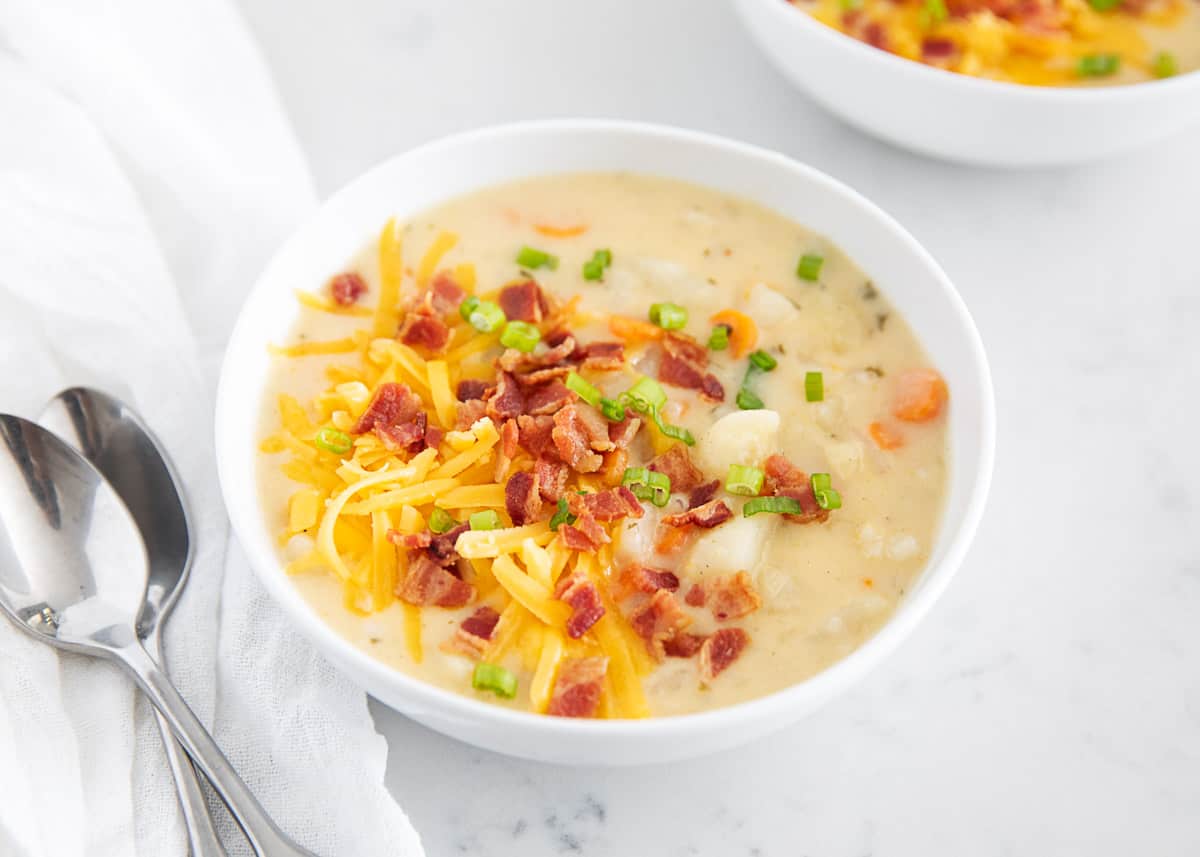 Bowl full of potato soup.