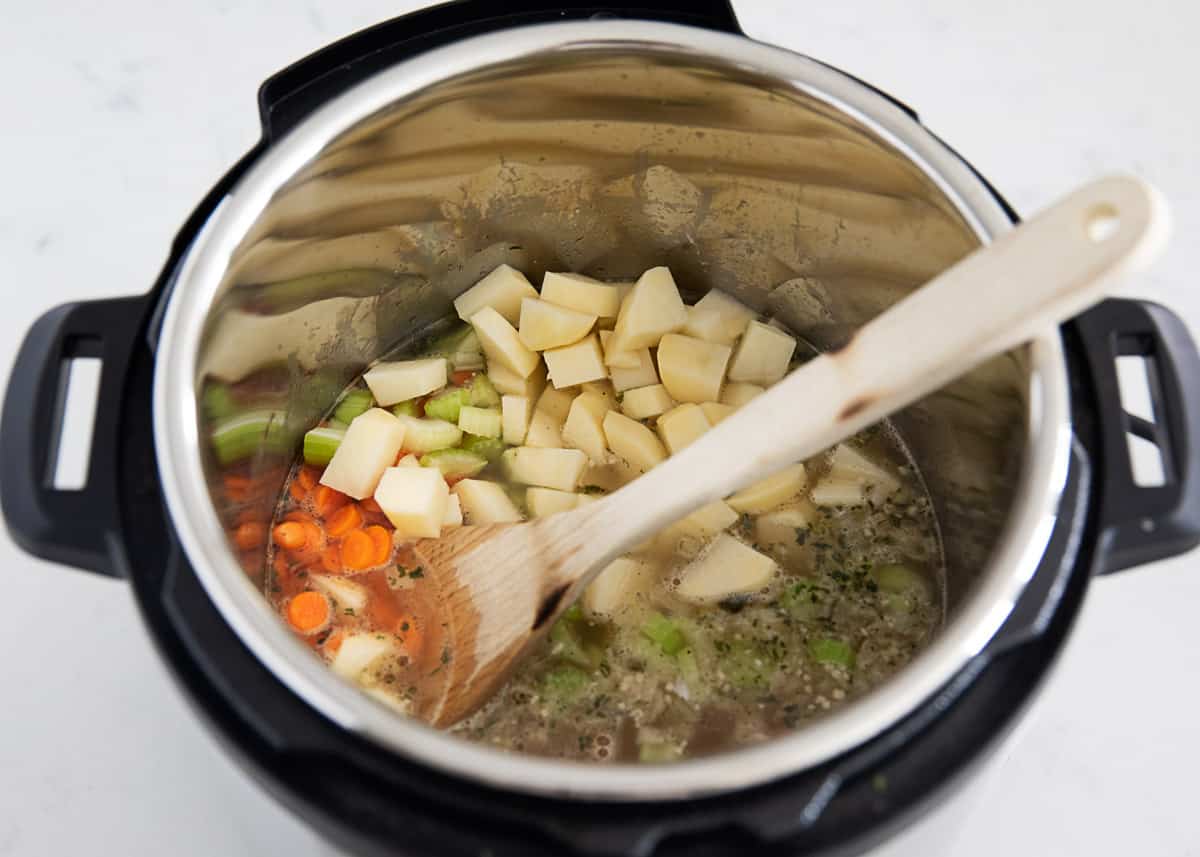 Making instant pot potato soup.