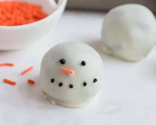 snowman oreo ball on counter