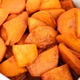 close up of candied yams in pan