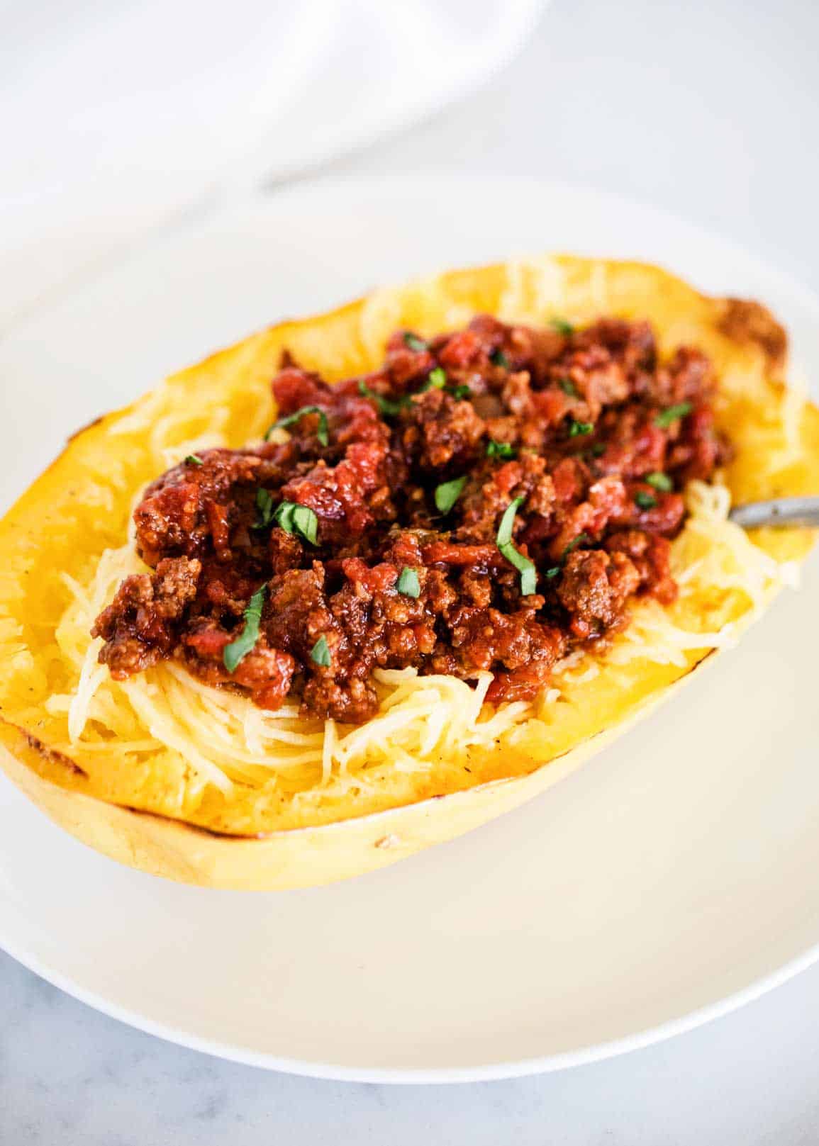 Spaghetti squash with meat sauce on plate.