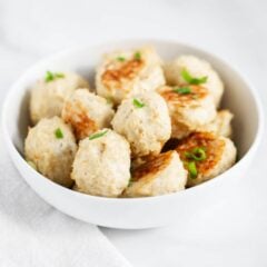 Bowl of easy chicken meatballs made with ground chicken and baked until golden.