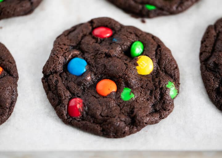 chocolate m&m cookie on pan close up