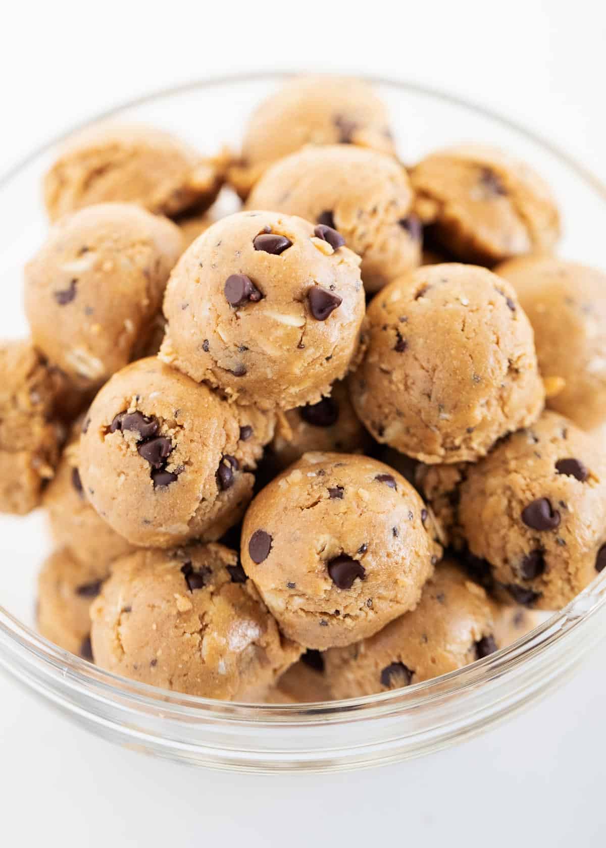 Kodiak cakes protein balls in clear bowl.