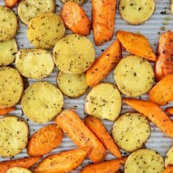 roasted potatoes and carrots on pan