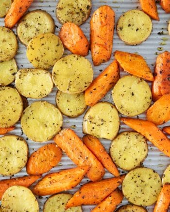 roasted potatoes and carrots on pan