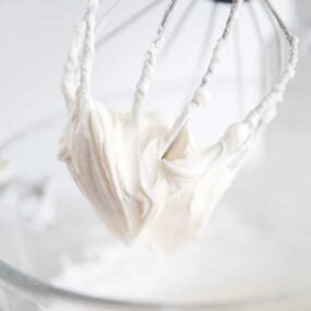 sour cream frosting in clear bowl