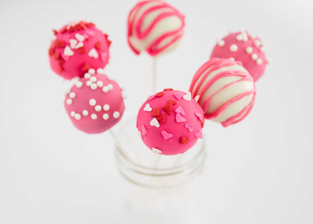 Valentine cake pops in glass jar.