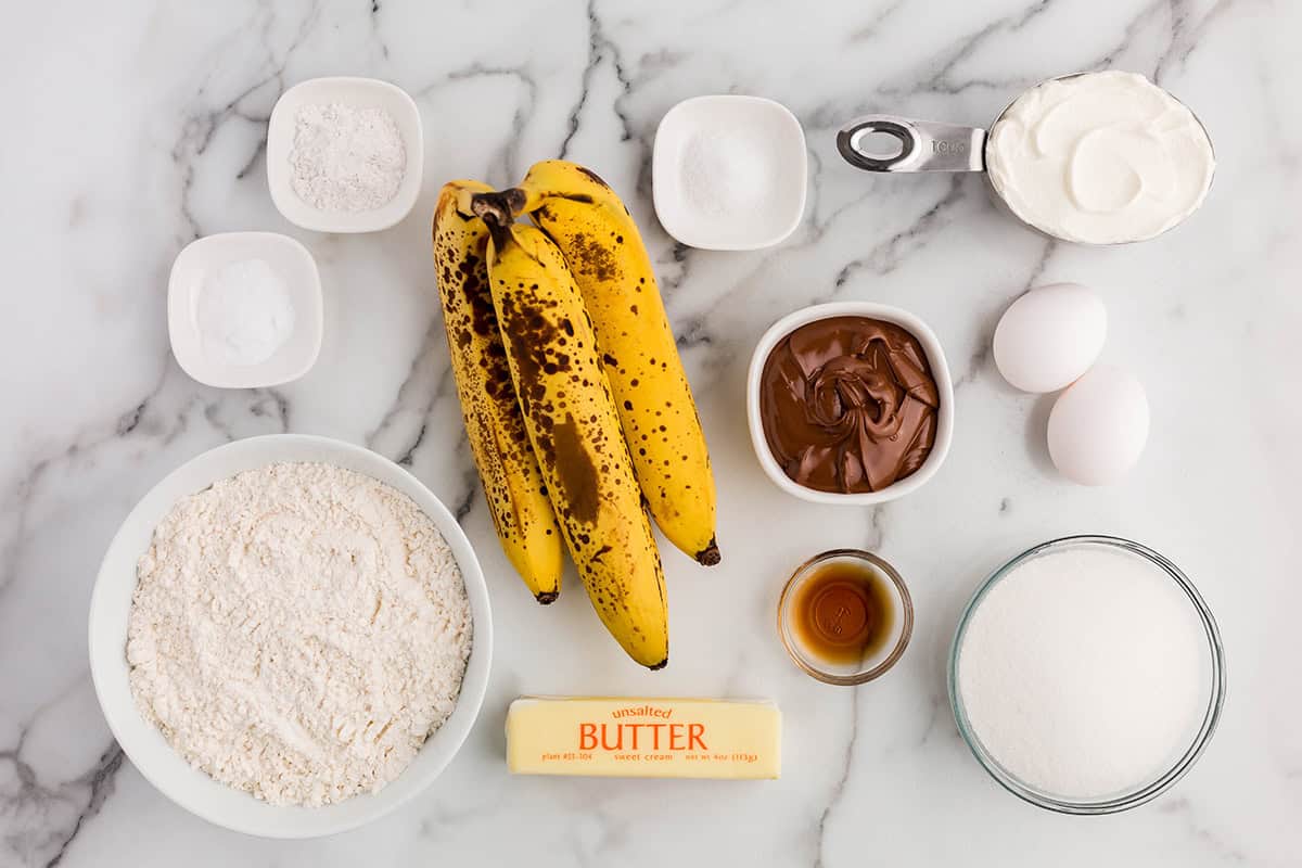 Banana Nutella muffin ingredients on the counter.