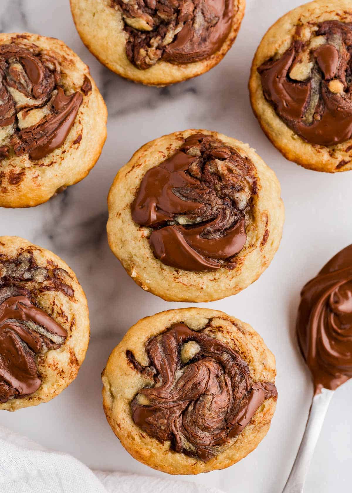 Banana nutella muffins on the counter. 