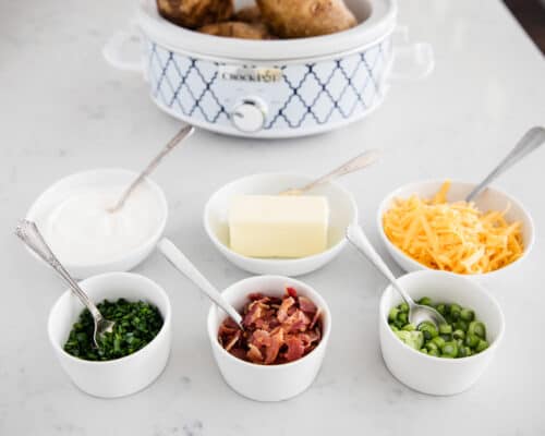 baked potato bar toppings in bowls