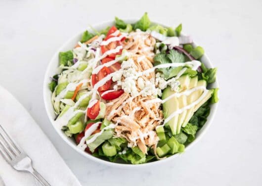 buffalo chicken salad in white bowl