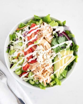 buffalo chicken salad in white bowl