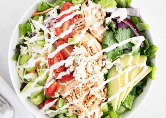 buffalo chicken salad in white bowl