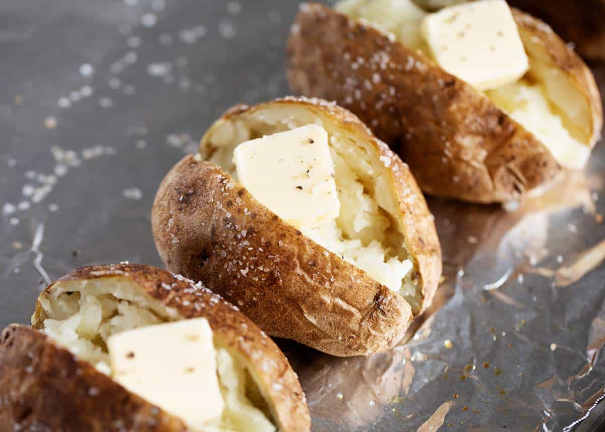 Baked potatoes on pan.