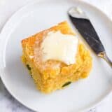 slice of cornbread on white plate