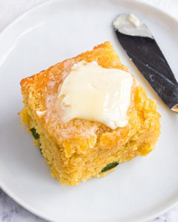 slice of cornbread on white plate