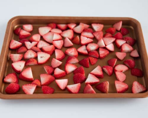 sliced strawberries on pan