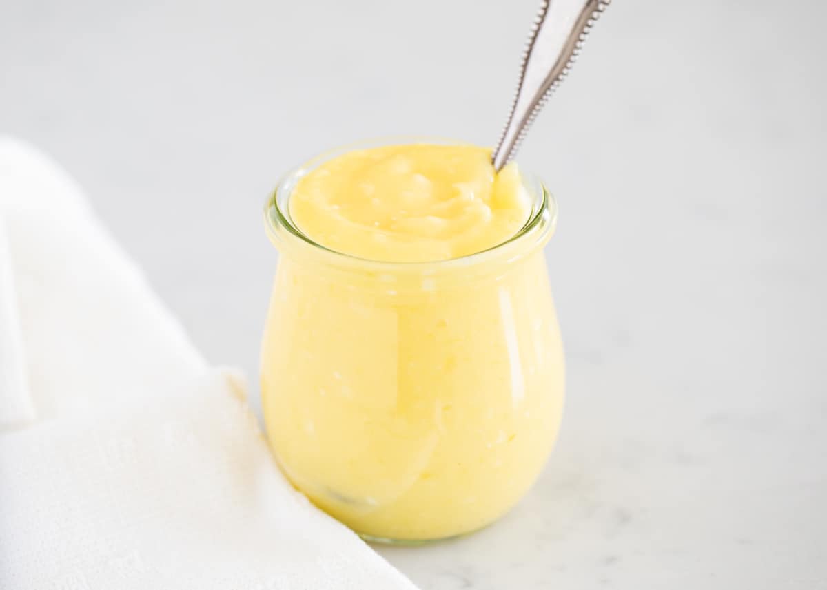 Lemon curd in jar.