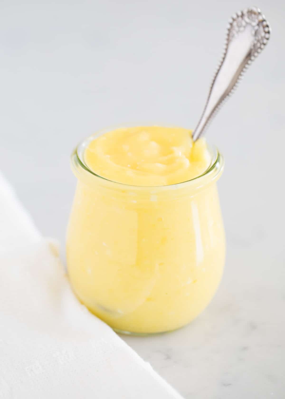 Lemon curd in jar.