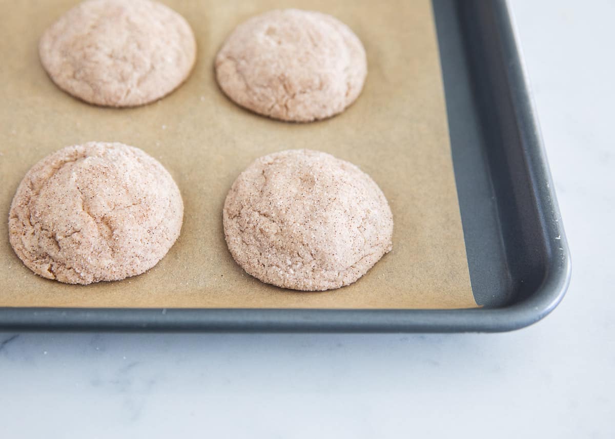 Snickerdoodle cake mix cookies on pan.