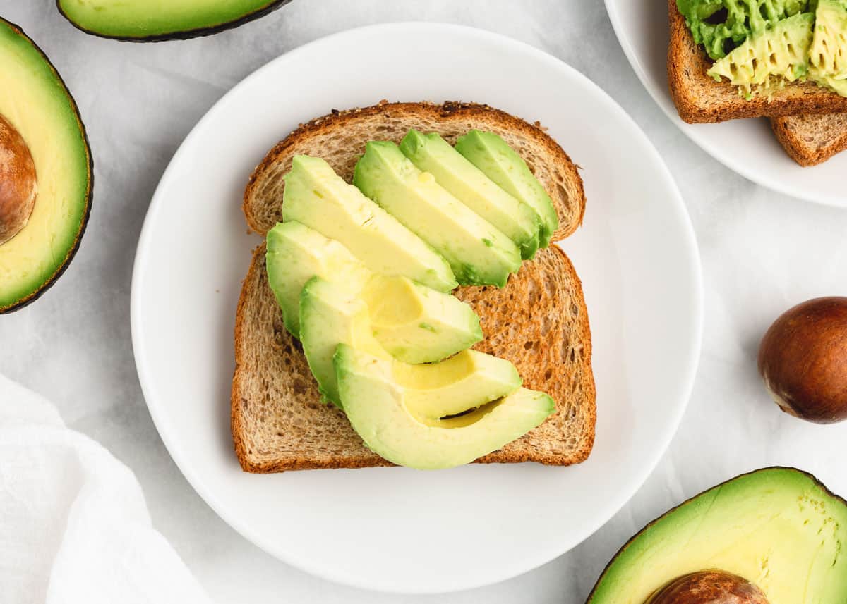 Sliced avocado on toast.