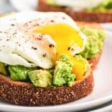 runny egg yolk on avocado toast