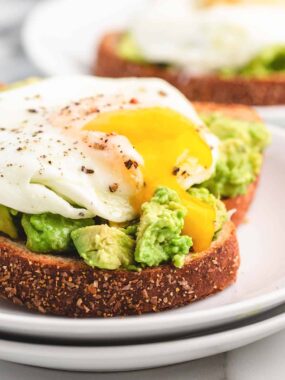 runny egg yolk on avocado toast